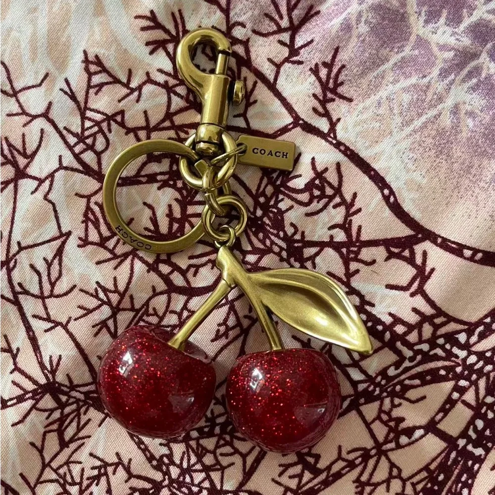 Coach Gold-Tone Red Glitter Cherry Key Charm